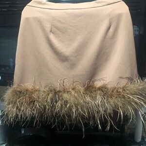 2precious short skirts suede with fringe and brown with feather trim